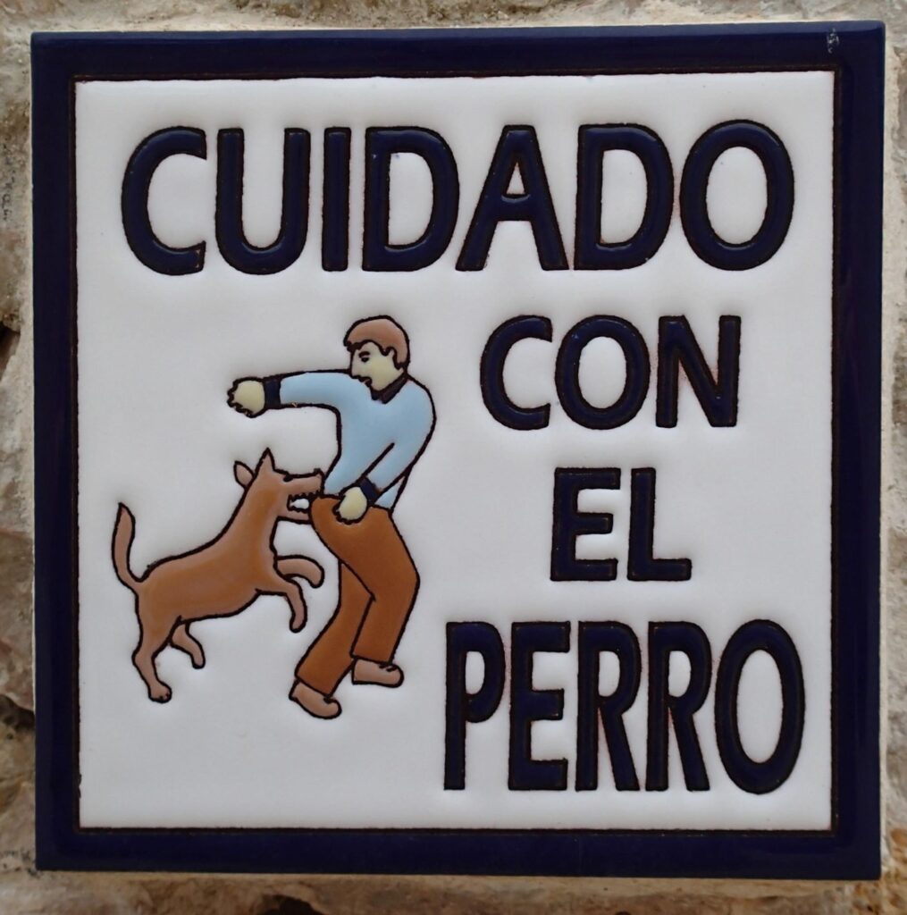 Beware of the dog sign Spain