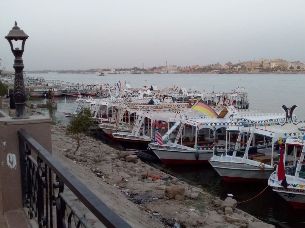 Tourist boats, southbound train Luxor