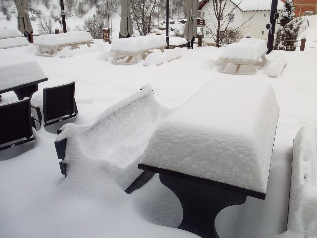 Snow fall outside a hotel