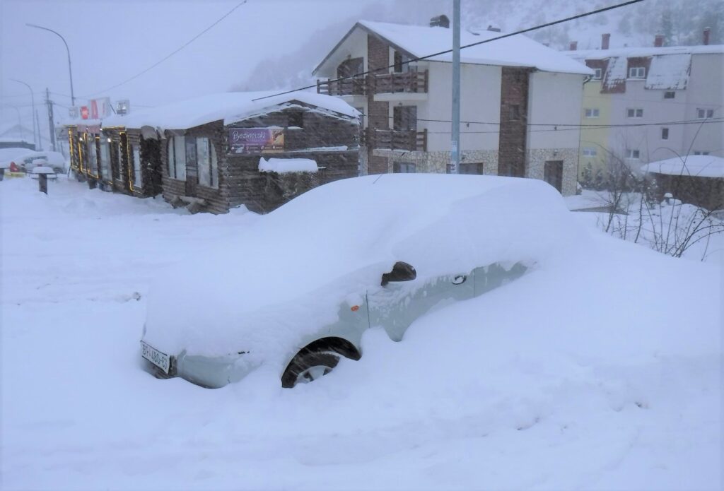 Snow covered car Mavrovo North Macedonia