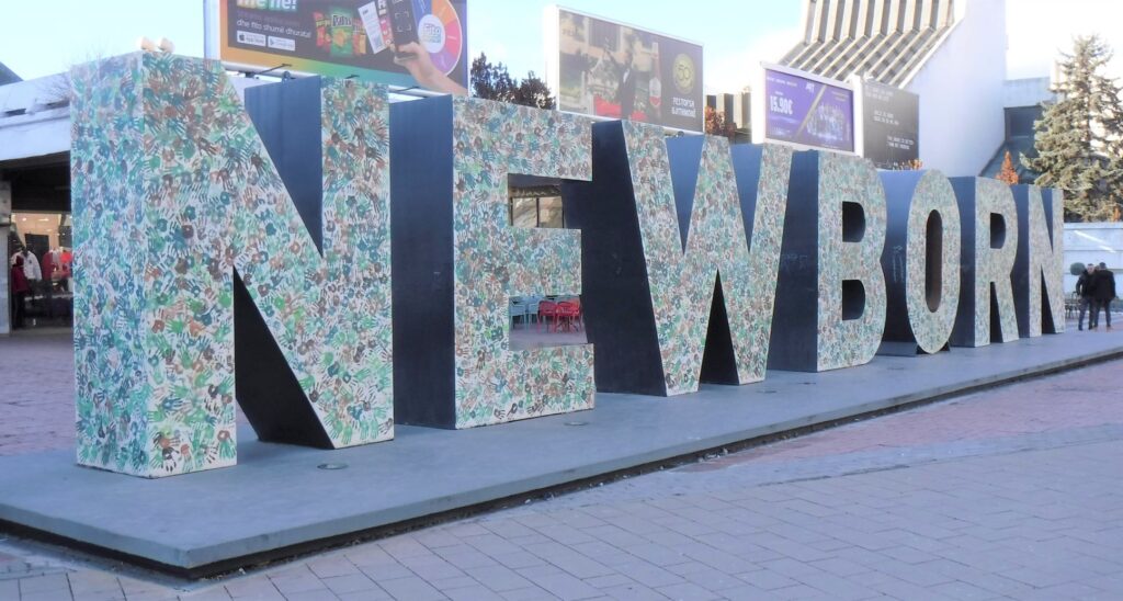 Newborn monument exploring Pristina