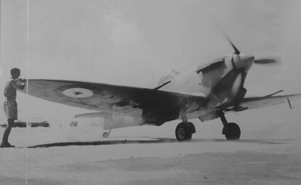 'A Spitfire of the Desert Air Force prepares to take off 1942'